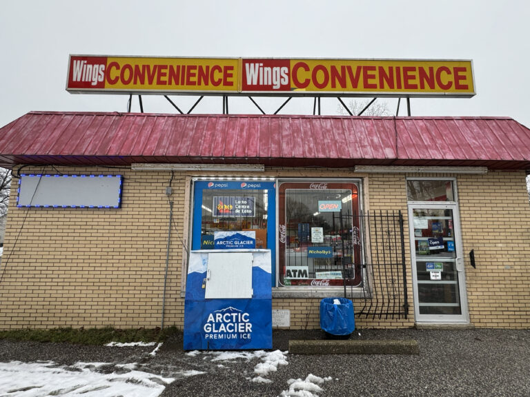 Storefront of Wings Convenience Store