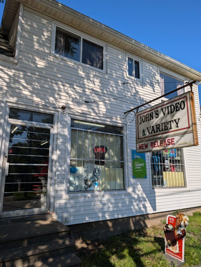 Storefront of John’s Convenience