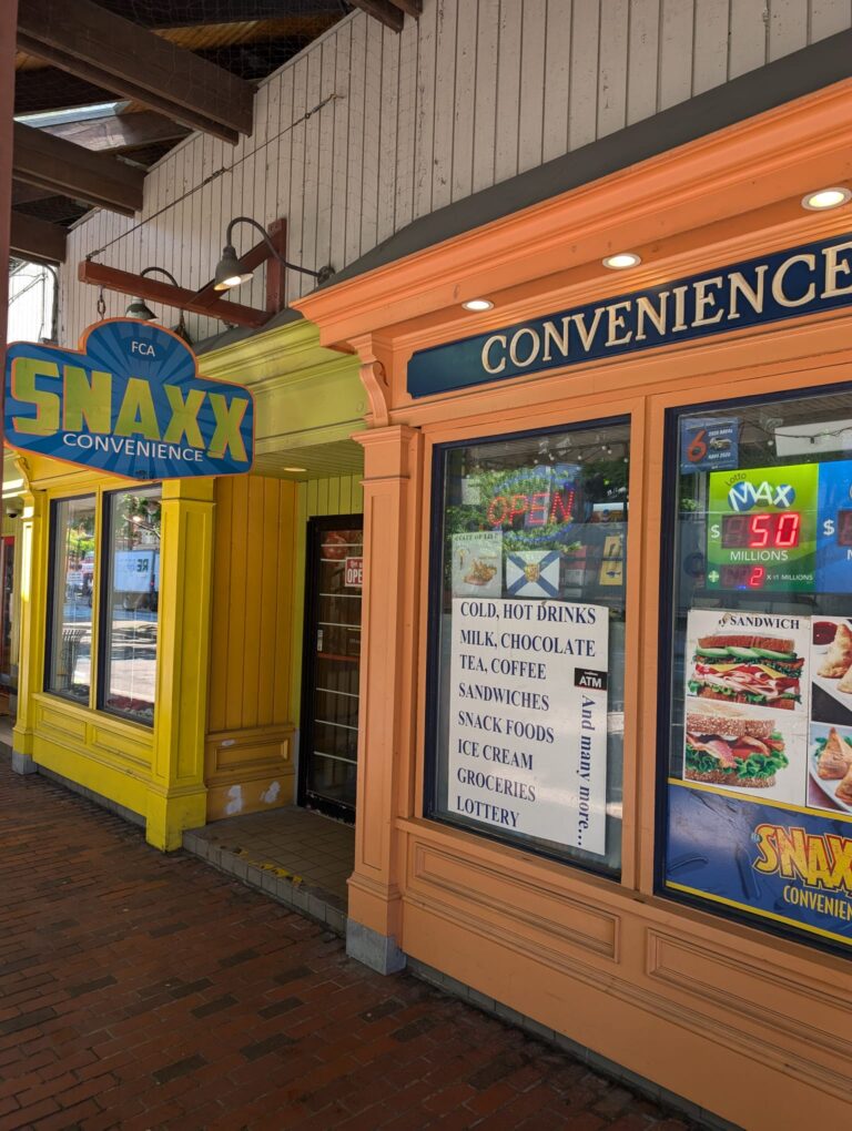 Storefront of SNAXX Convenience