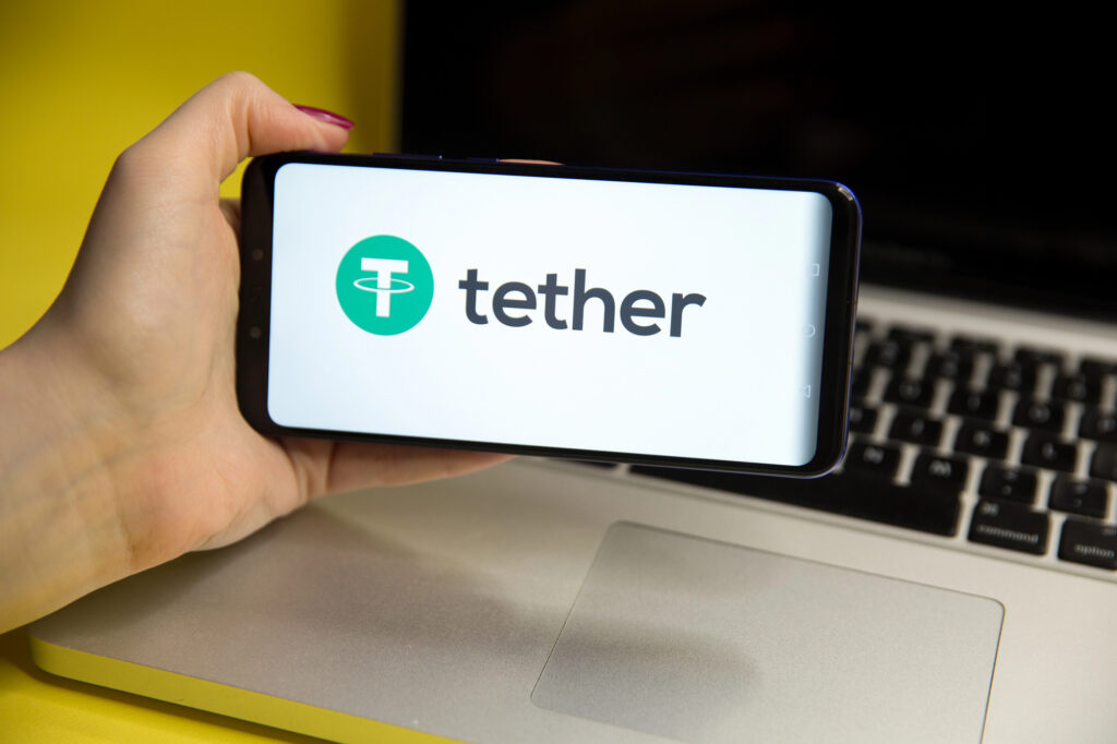 Tether USDT stablecoin logo displayed on smartphone screen